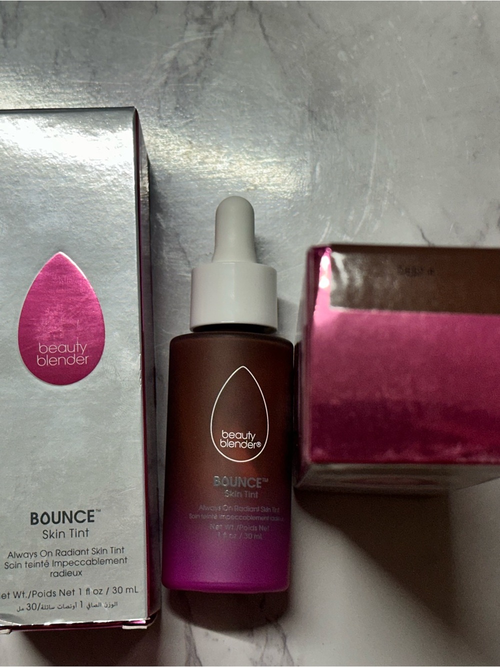 beautyblender Bounce Skin Tint Bottle in Pink and Brown
